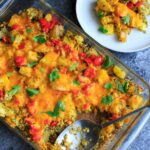 Broccoli and cheese baked potato casserole with parsley, with one plated serving