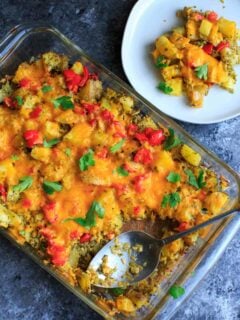 Broccoli and cheese baked potato casserole with parsley, with one plated serving