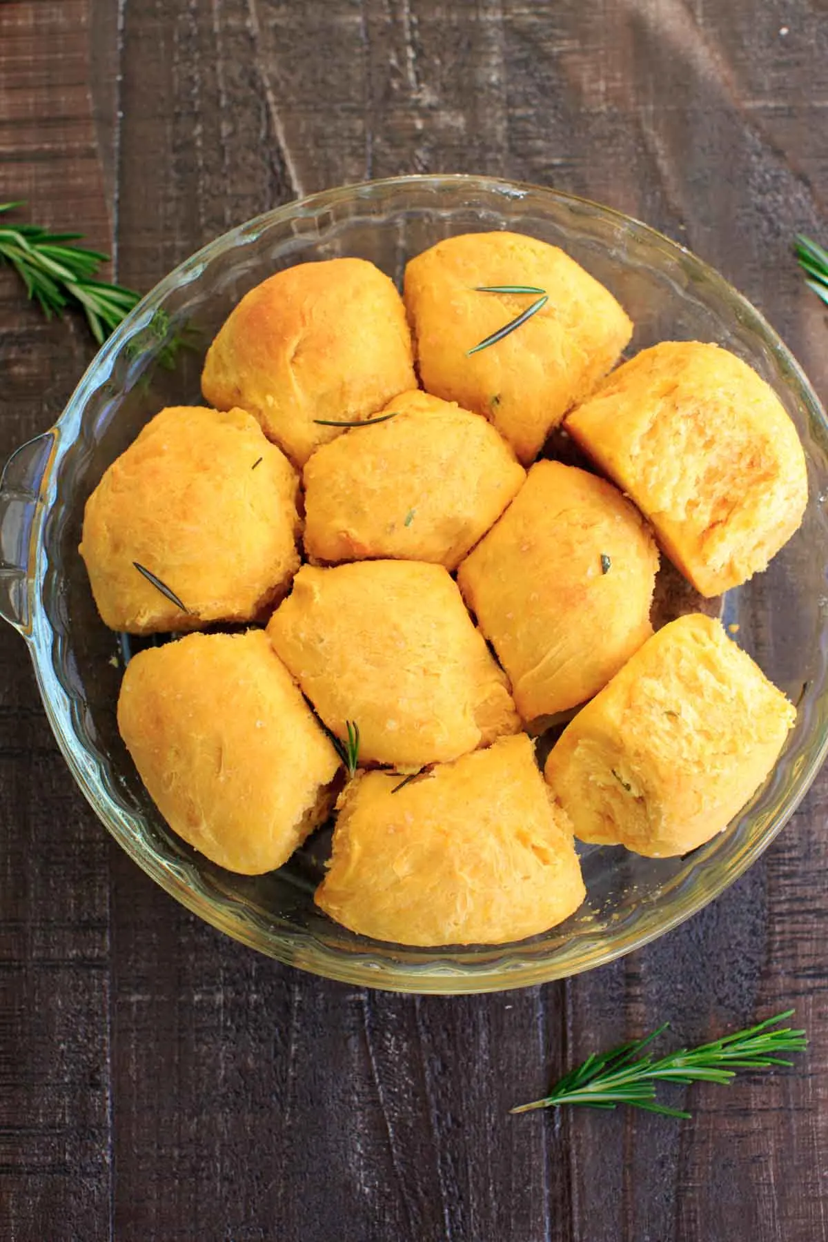 Rosemary Sweet Potato Dinner Rolls in glass baking dish