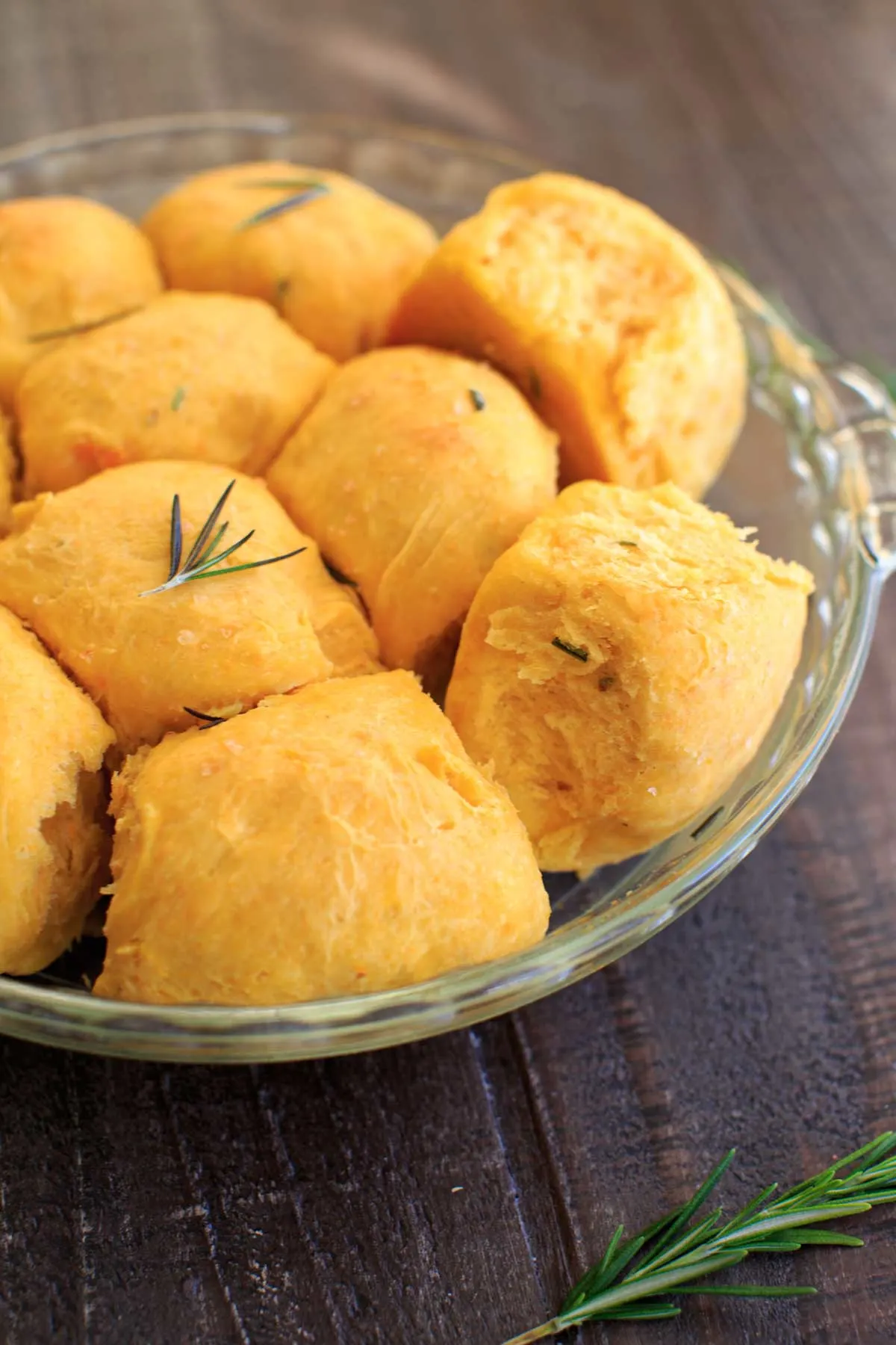 Rosemary Sweet Potato Dinner Rolls in glass baking dish