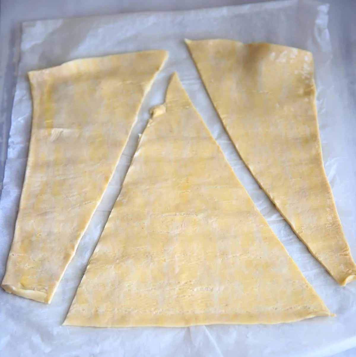 Cutting the puff pastry into triangles