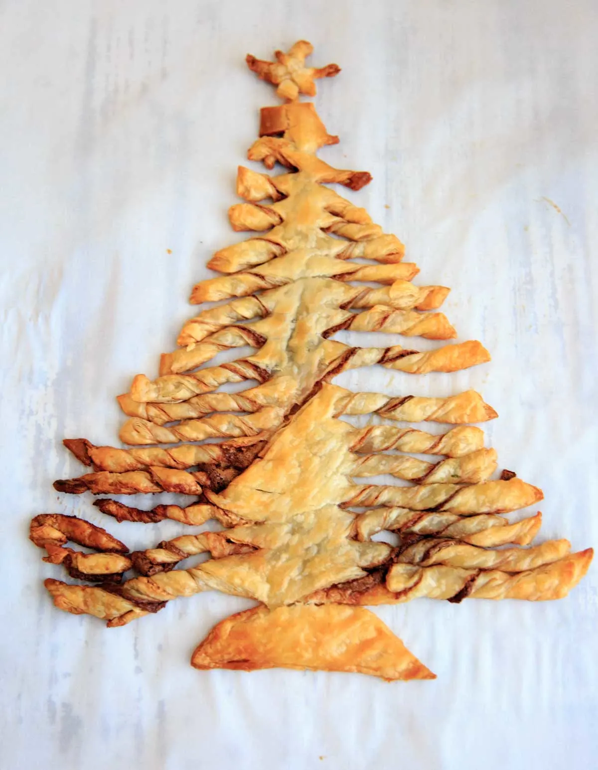The Nutella and peanut butter puff pastry Christmas tree dessert, after baking