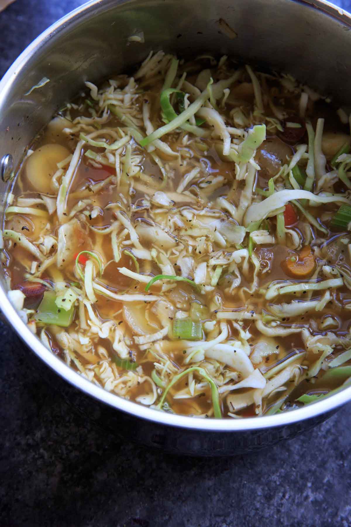 non-starchy veggies with cabbage in stove pot - detox cabbage soup