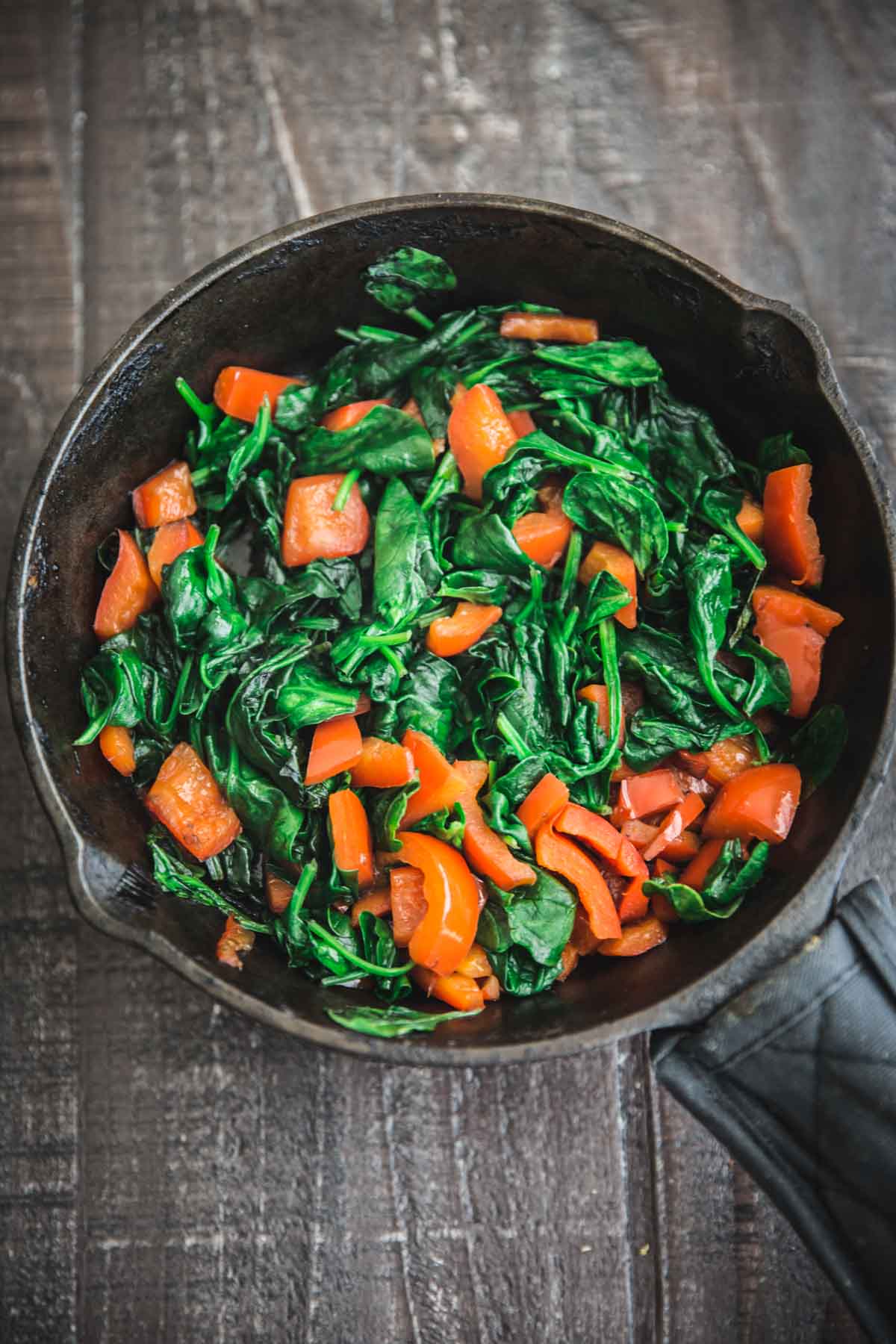 sauteed spinach and bell pepper for the Spinach Ricotta Crescent Wrap recipe