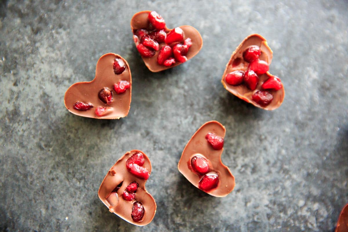 Chocolate Pomegranate Candy Recipe - chocolate pomegranate pom pom heart shaped bites