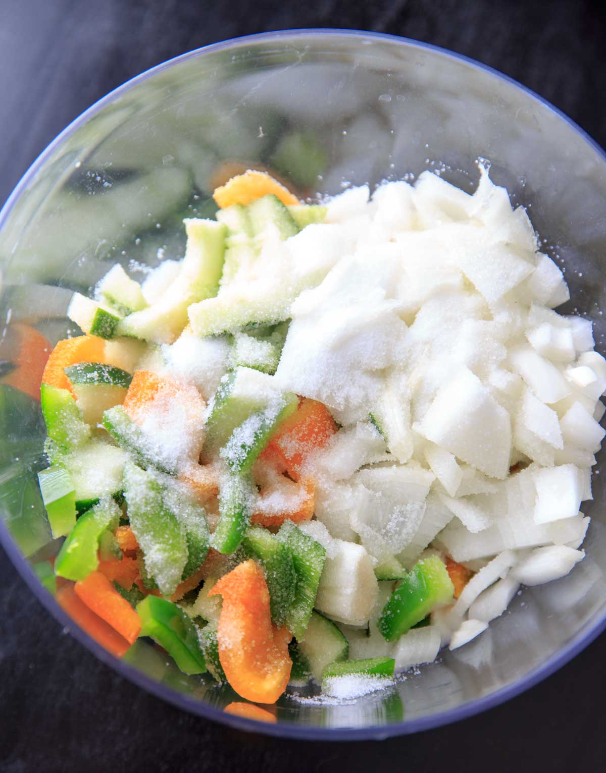 Homemade Sweet Pickle Relish Recipe - raw veggies with salt