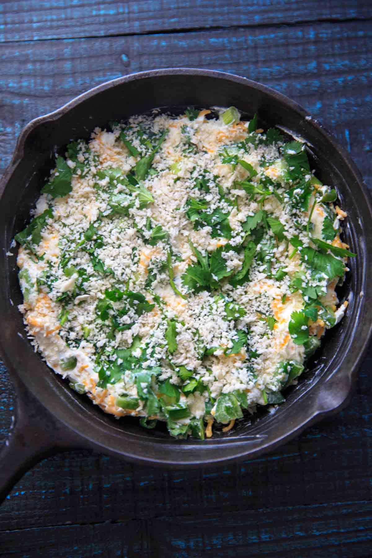 Jalapeno Popper Dip in cast iron before baking