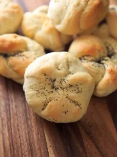 Homemade Kaiser Rolls Recipe - rolls after baking with poppy seeds