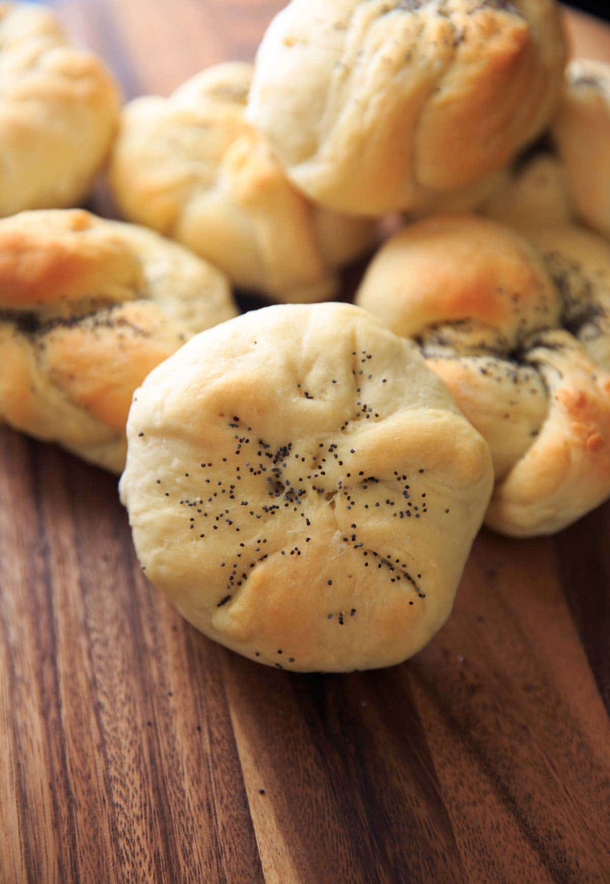 Homemade Kaiser Rolls Recipe - rolls after baking with poppy seeds