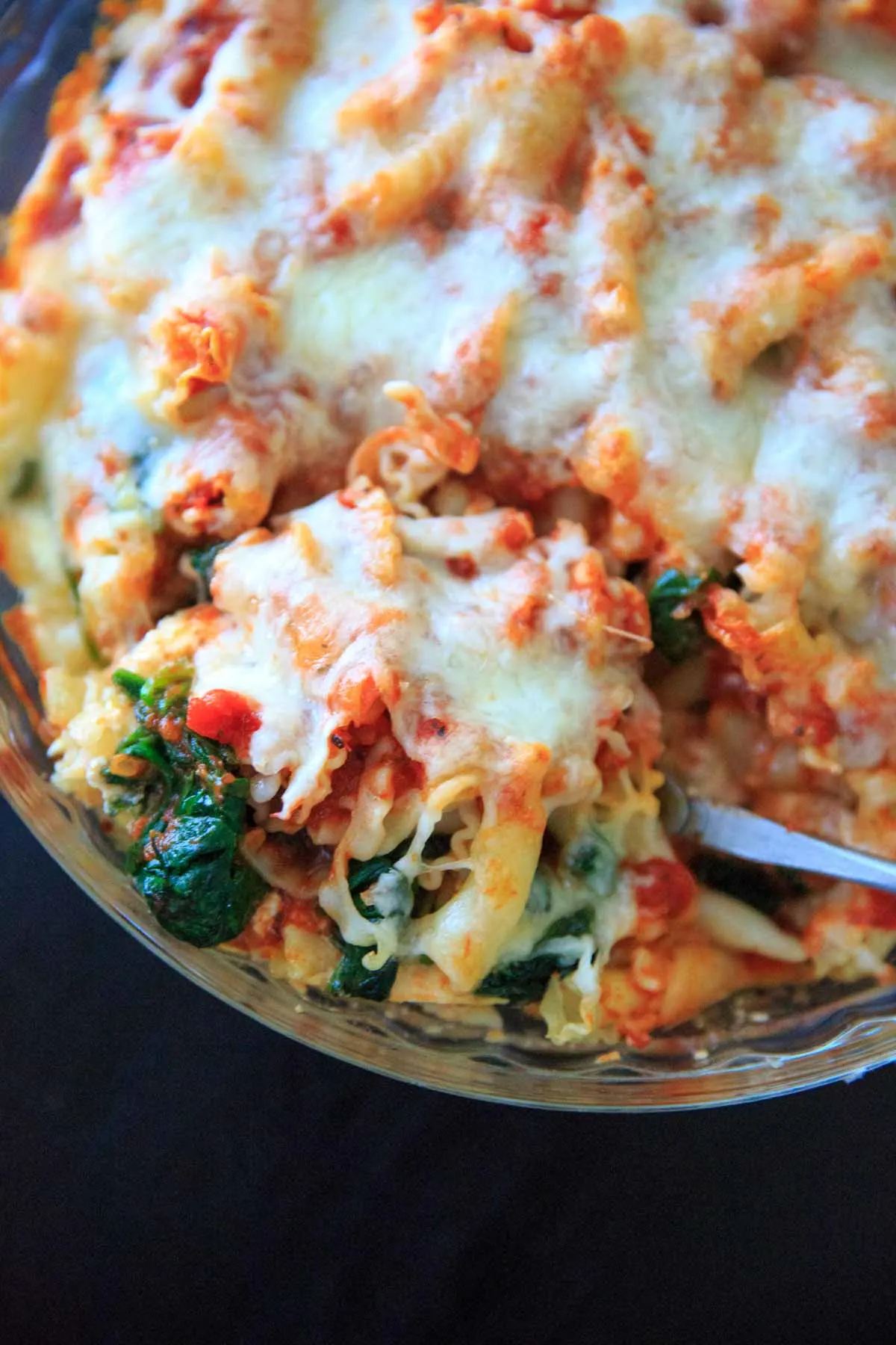 Spinach Baked Ziti Recipe - A meatless pasta casserole with greens that is sure to be a family favorite! Adapted from my grandma's baked ziti recipe and scaled down to 4 (generous) servings.