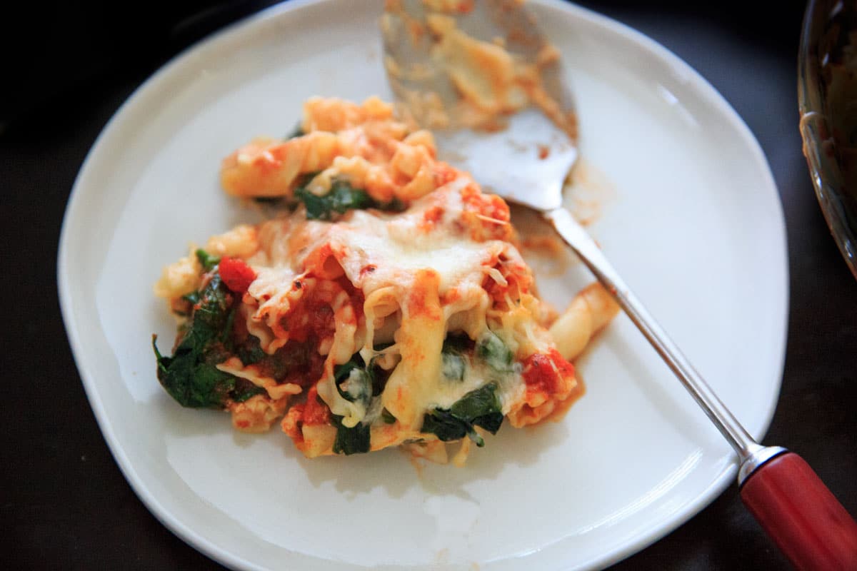 Spinach Baked Ziti Recipe - A meatless pasta casserole with greens that is sure to be a family favorite! Adapted from my grandma's baked ziti recipe and scaled down to 4 (generous) servings.