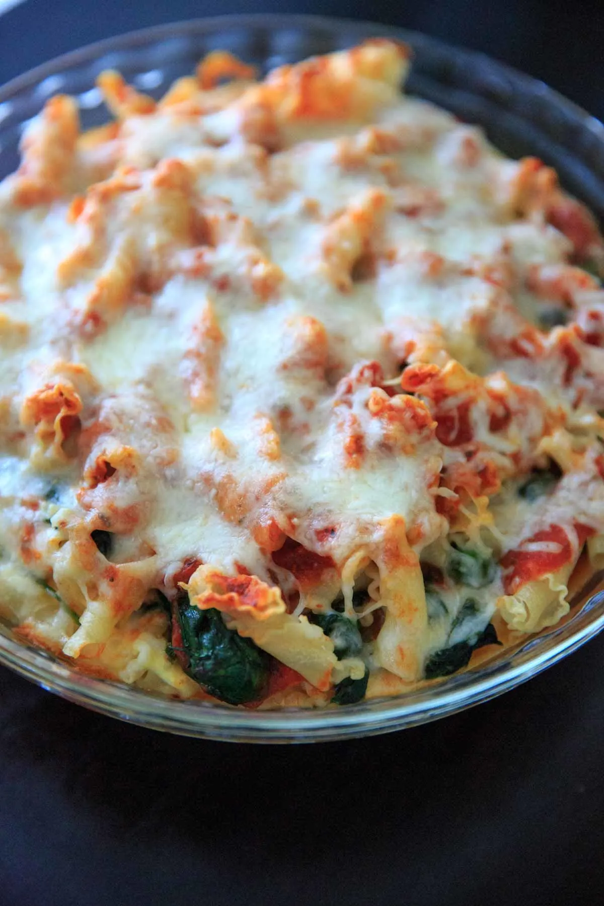Spinach Baked Ziti Recipe - A meatless pasta casserole with greens that is sure to be a family favorite! Adapted from my grandma's baked ziti recipe and scaled down to 4 (generous) servings.