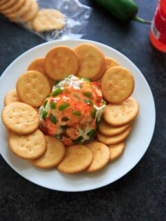 Sweet Chili Cream Cheese Dip - a super easy, 4 ingredient appetizer that is perfect for a party snack or sharable dip. Sweet and spicy and delicious!