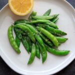 A citrusy and tasty vegetable side dish - Stir-fried Lemon Sesame Sugar Snap Peas! Eat as is for a side, add to pasta or salads.
