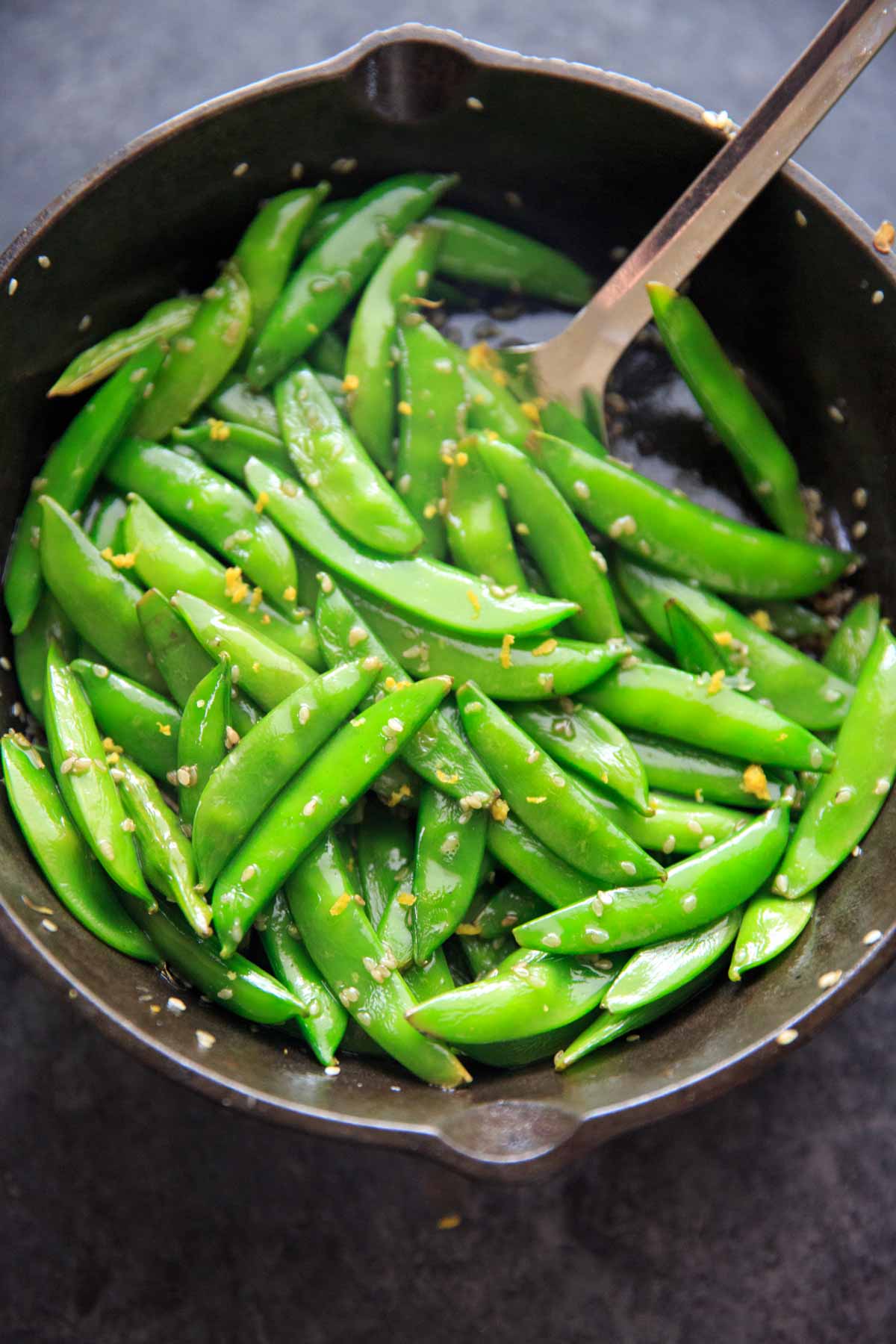 A citrusy and tasty vegetable side dish - Stir-fried Lemon Sesame Sugar Snap Peas! Eat as is for a side, add to pasta or salads.