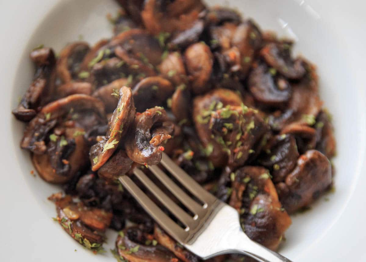 Chili White Button Mushrooms with a bite full on fork