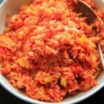 Nana's Spanish Rice recipe - a super easy, one pan / one pot side dish that takes only minutes to throw together. No need to pre-cook the rice! Naturally vegan and gluten-free.