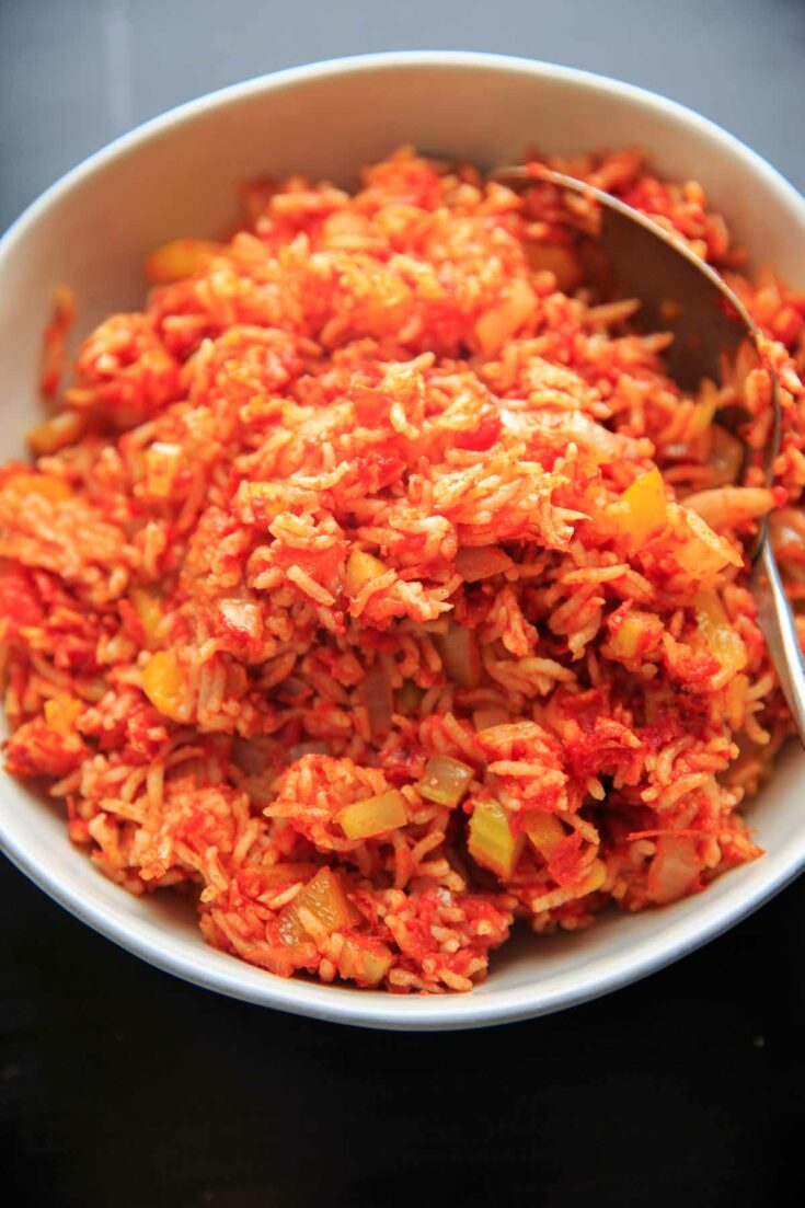 Nana's Spanish Rice recipe - a super easy, one pan / one pot side dish that takes only minutes to throw together. No need to pre-cook the rice! Naturally vegan and gluten-free.