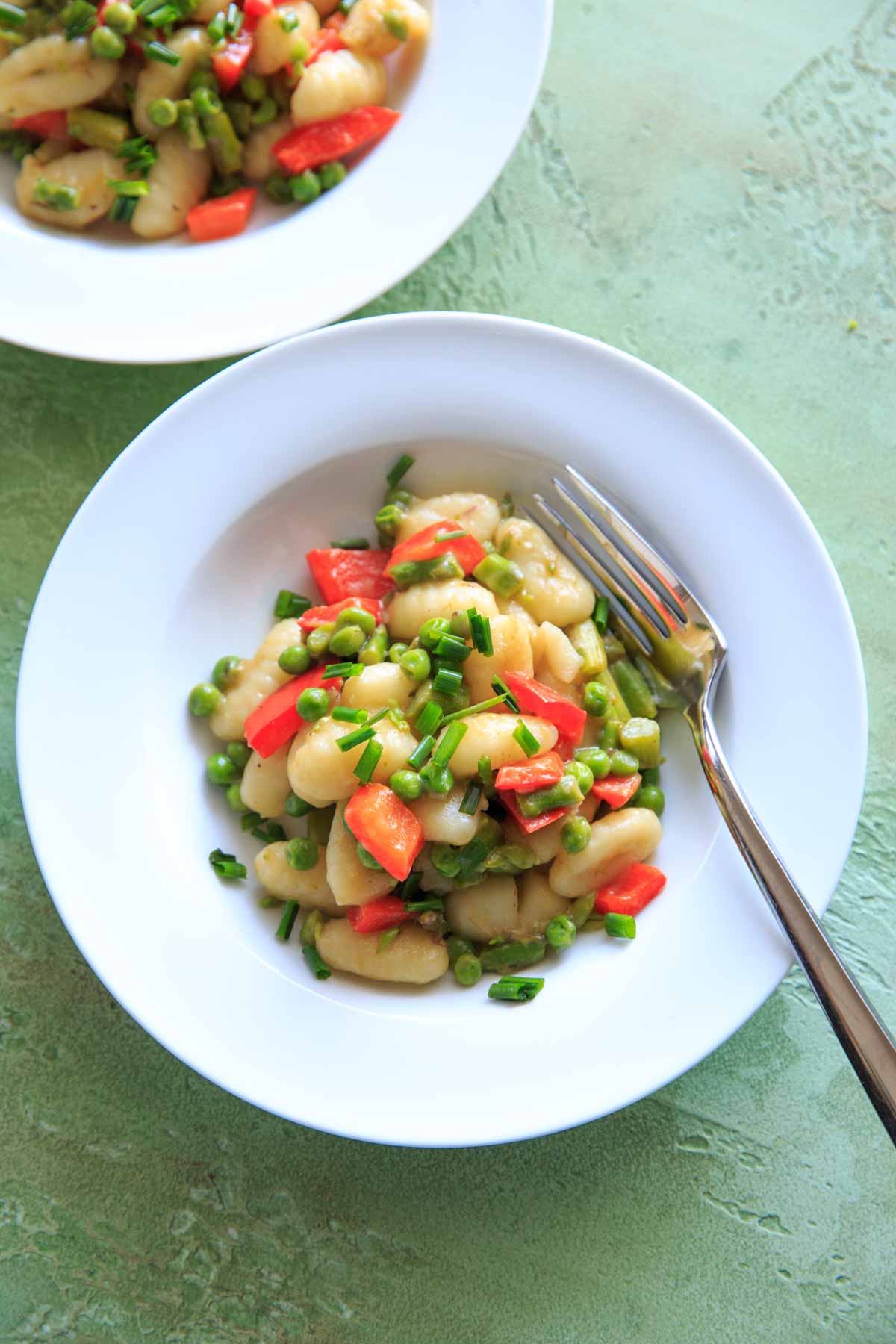 vegetables and gnocchi in bowl