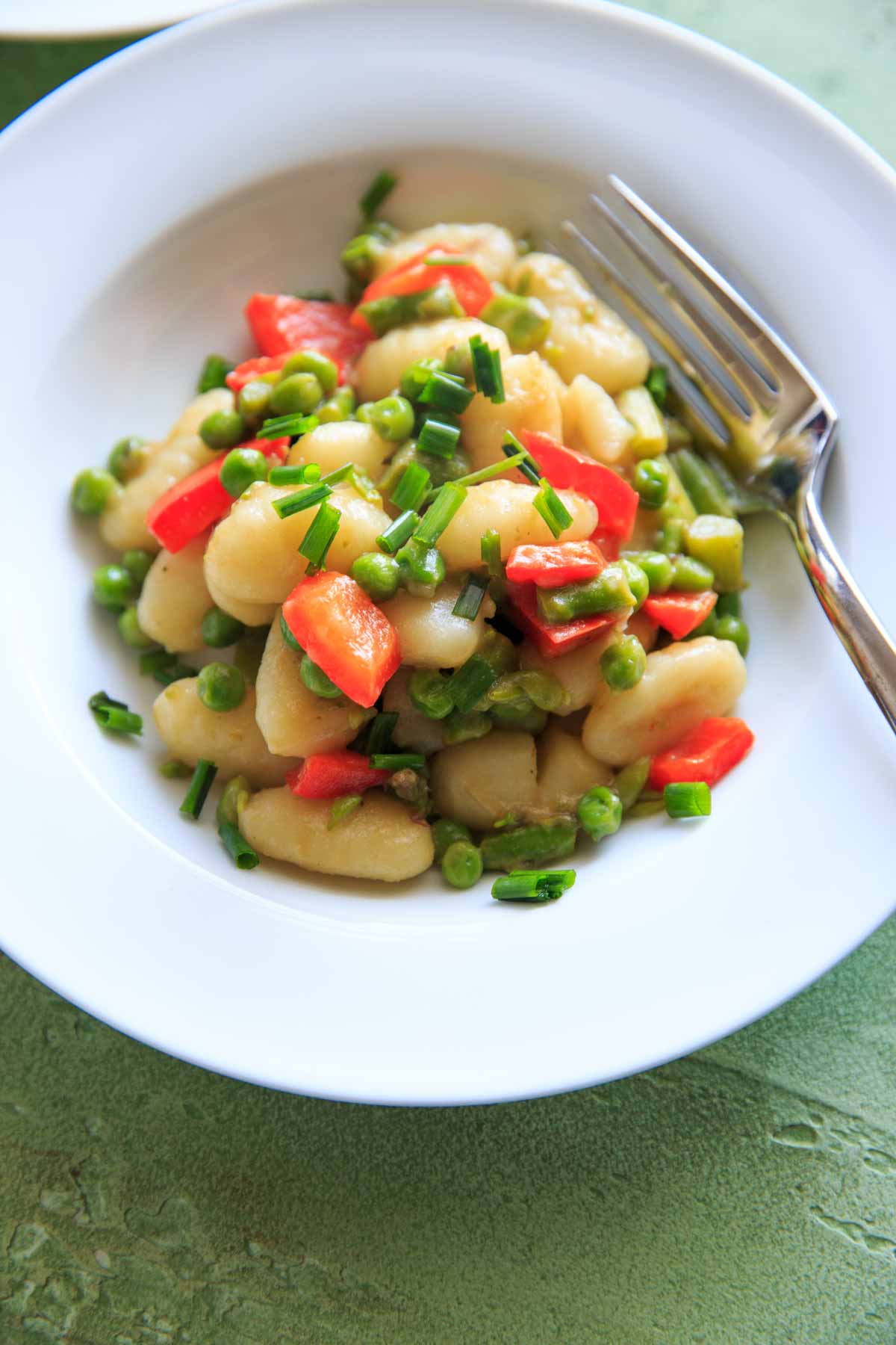 before adding cheese to gnocchi and vegetables