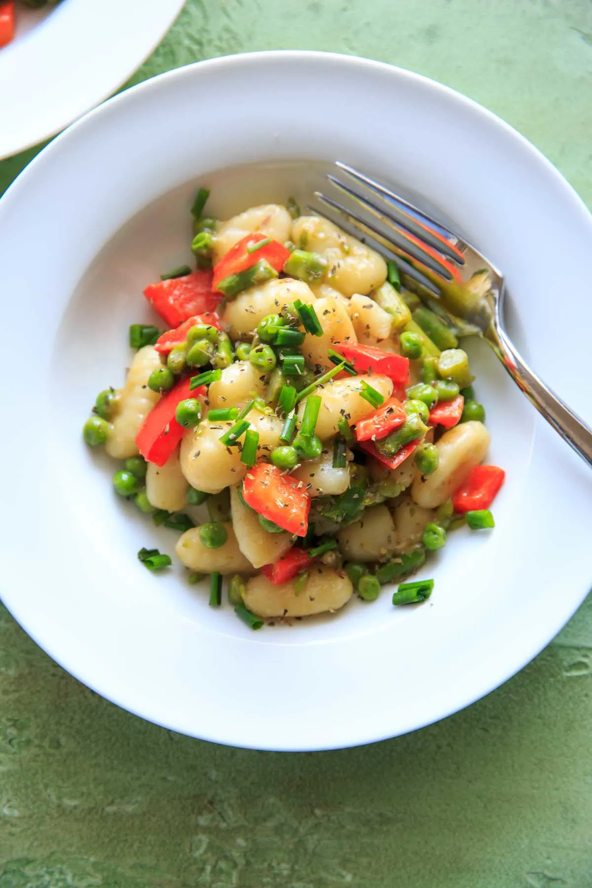 gnocchi and vegetables in bowl