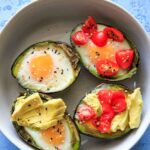 Baked Egg in Avocado (Avocado "Nests") are a fun way to have a balanced snack or breakfast, or a cute mini serving for a brunch! Customizable with toppings and will last a day or two in the fridge, so you can bake ahead if needed! Low-carb, protein, fiber and healthy fats.