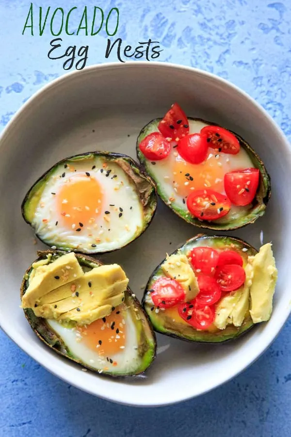 Baked Egg in Avocado (Avocado "Nests") are a fun way to have a balanced snack or breakfast, or a cute mini serving for a brunch! Customizable with toppings and will last a day or two in the fridge, so you can bake ahead if needed! Low-carb, protein, fiber and healthy fats.
