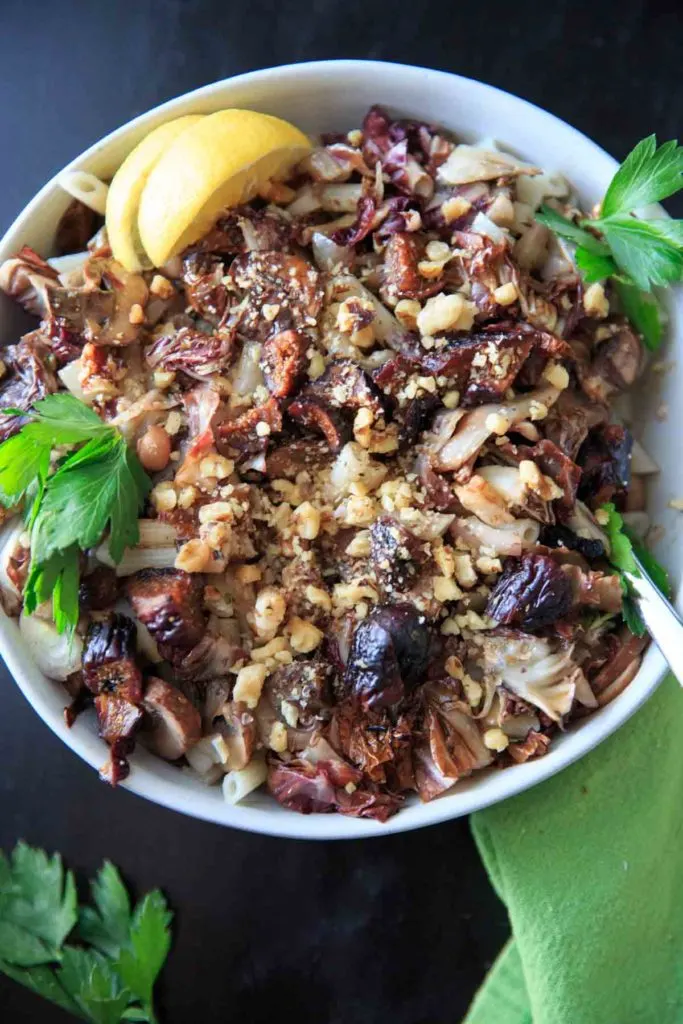 Penne with rosemary-roasted winter vegetables and balsamic-fig sauce. A tangy balsamic sauce with earthy vegetables and sweet figs, this vegan and gluten-free dish is sure to impress!