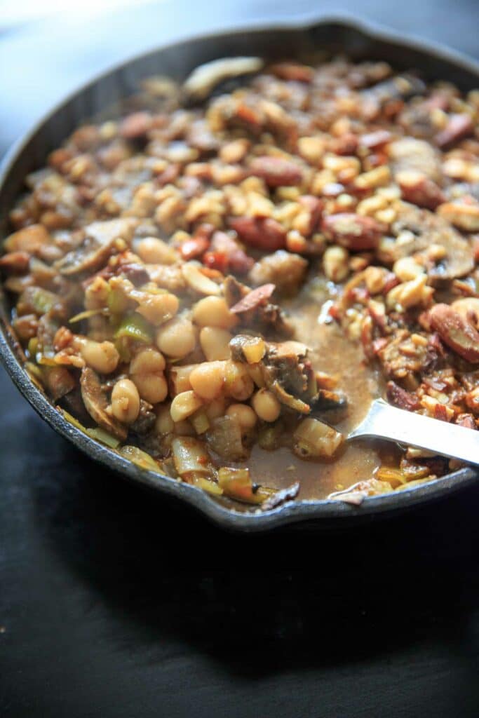 Finished dish Ingredients for White bean and mushroom cassoulet with parsley-red onion salad