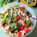 Caprese Pasta Salad - Tomatoes, basil, mozzarella, balsamic and olive oil on pasta