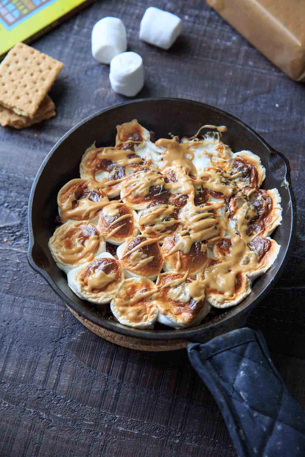 easy oven baked s'mores in a cast iron skillet