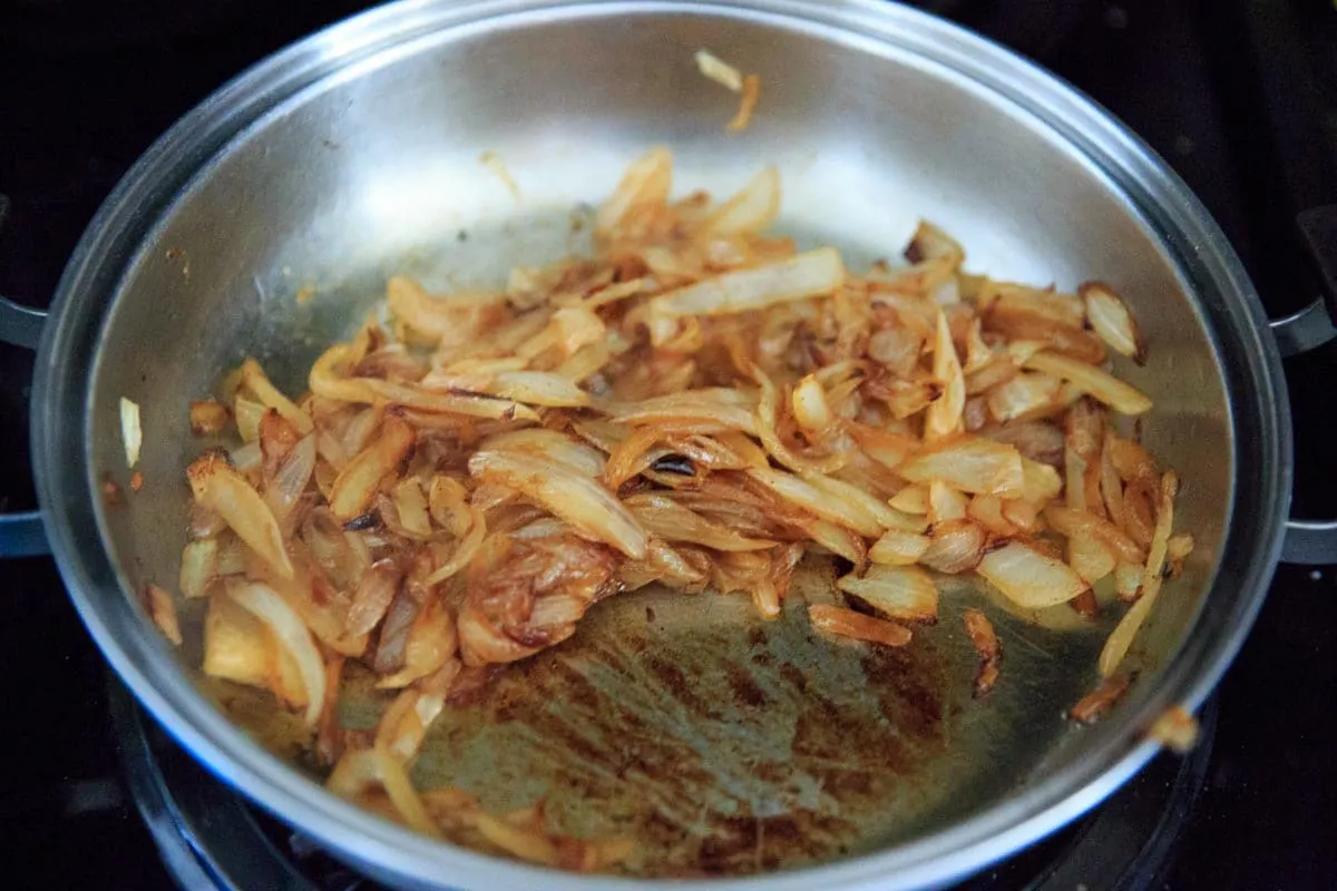 step 3 - continue to stir as onions cook down and begin to caramelize