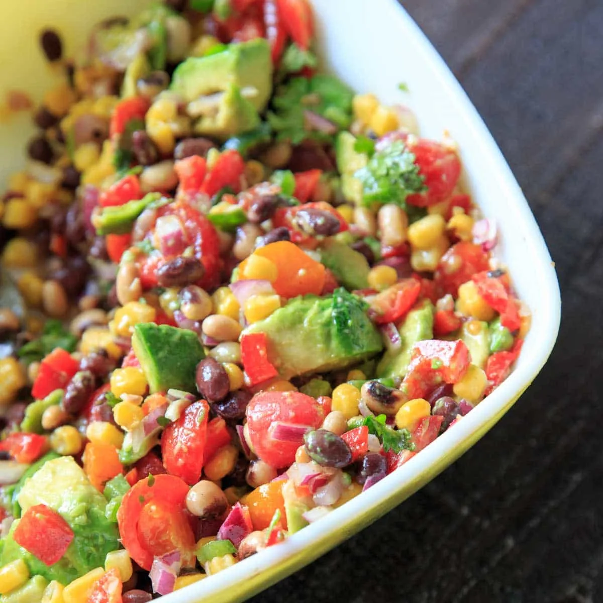 Texas Cowboy Caviar marinated with oil dressing and with avocados close up