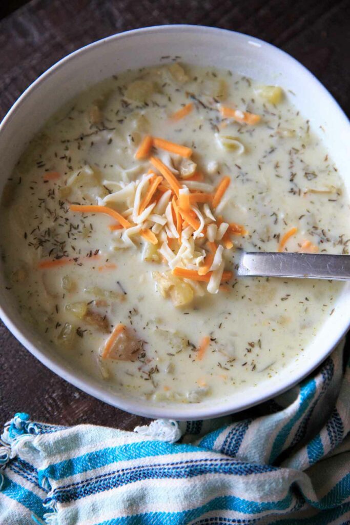 Chunky potato soup with loads of herbs makes for a lovely comforting cold-weather meal in the fall. Make it creamy if you want, Gluten-free with dairy-free option.