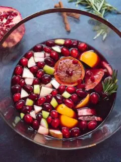 Holiday Sangria - a dry red wine winter sangria that's not too sweet, filled with fruit and is designed to make you feel cozy.