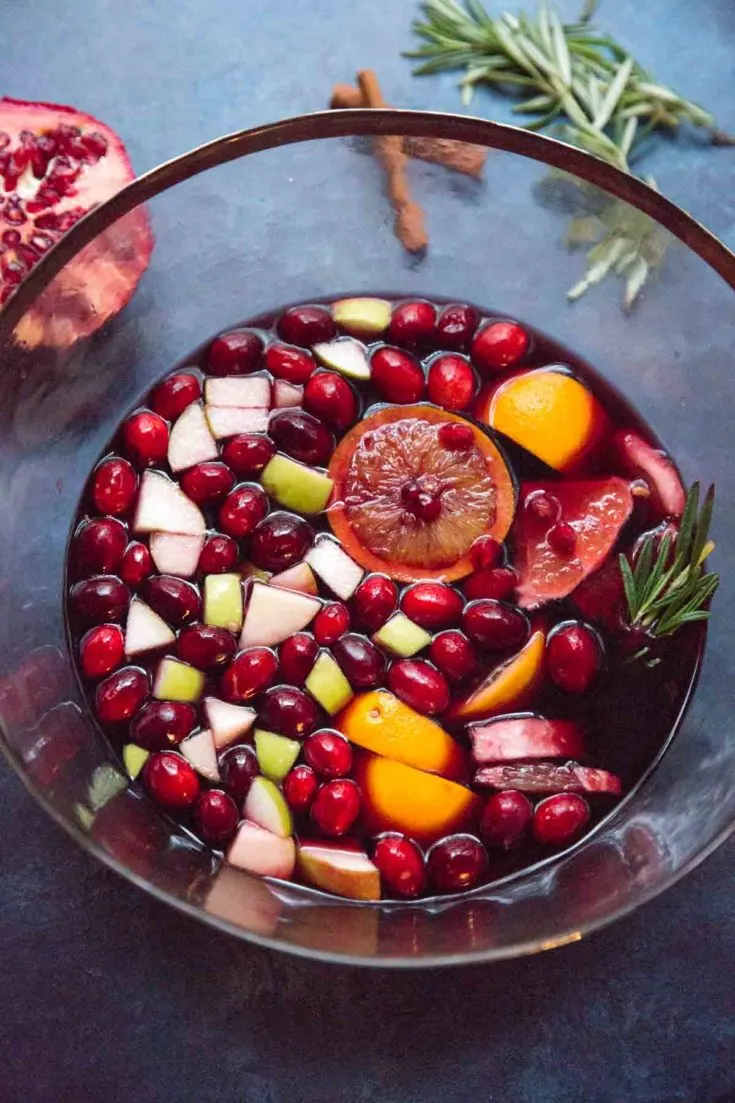 Holiday Sangria - a dry red wine winter sangria that's not too sweet, filled with fruit and is designed to make you feel cozy.