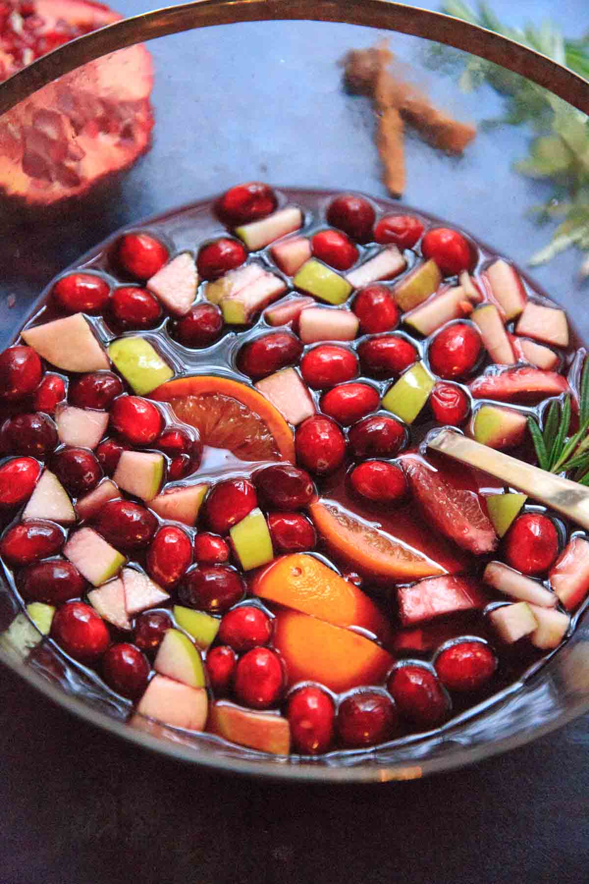 Holiday Sangria in serving bowl with fruit