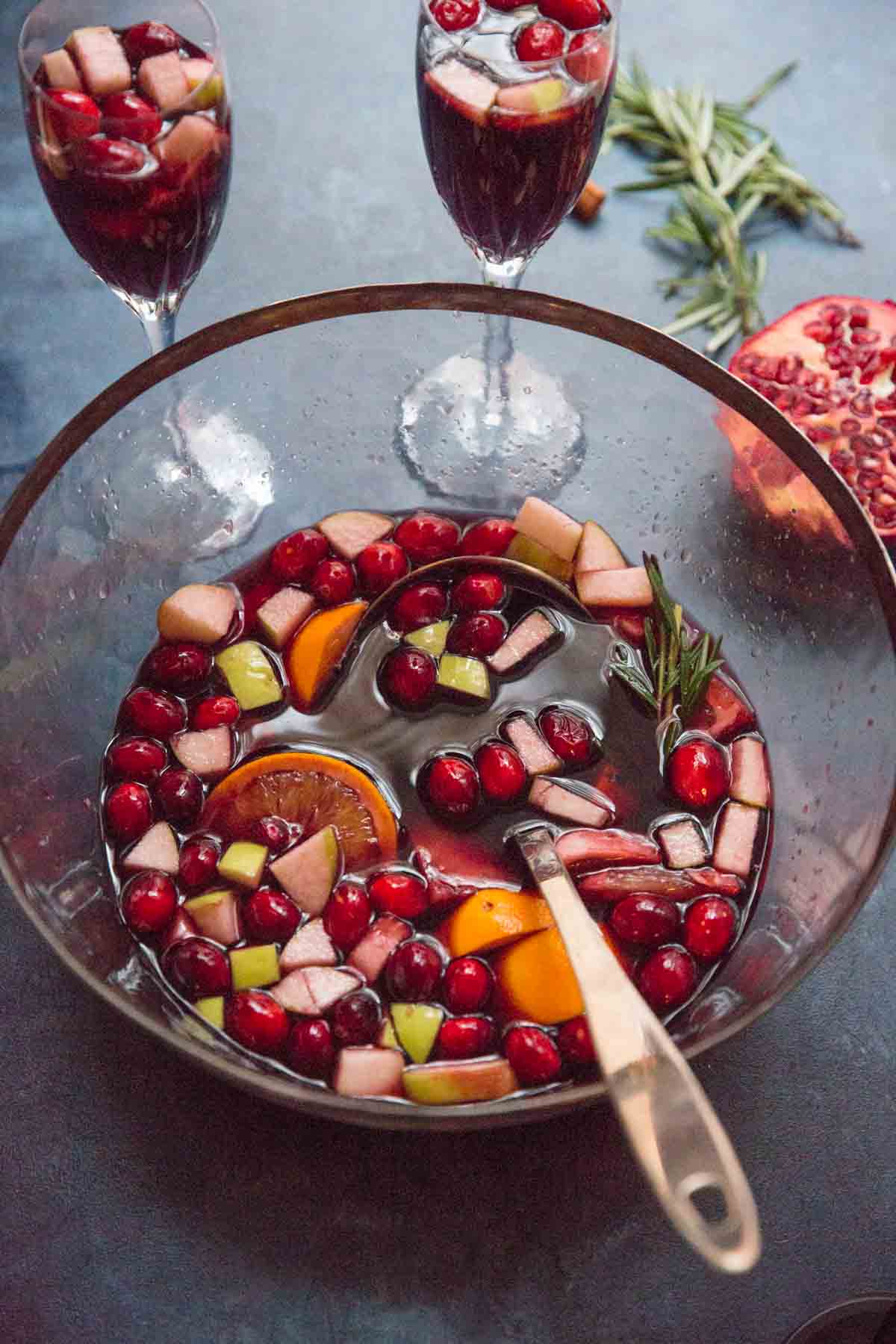 Holiday Sangria  in large serving bowl with serving spoon