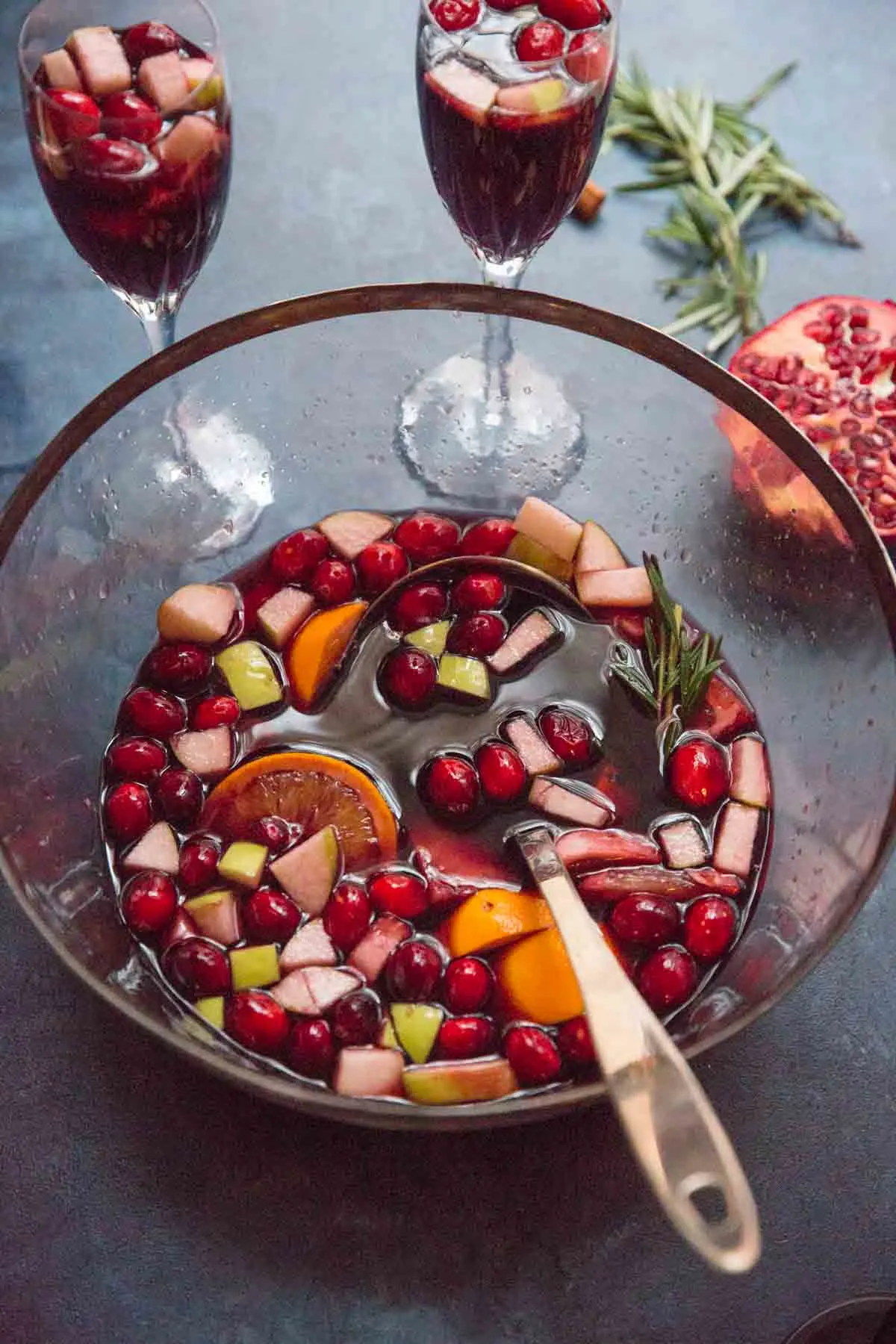 Holiday Sangria in large serving bowl with serving spoon