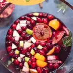 Holiday Sangria - a dry red wine winter sangria that's not too sweet, filled with fruit and is designed to make you feel cozy.