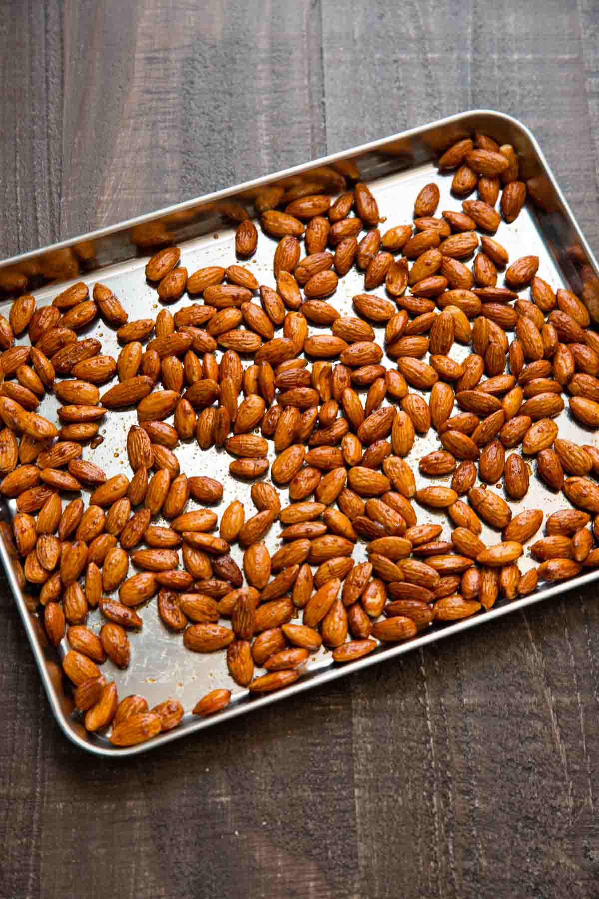 cinnamon honey roasted almonds on sheet pan