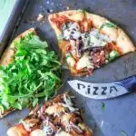 Upgrade your pizza night by making homemade pizza with caramelized onions, mushrooms, fresh baby arugula and brie cheese! You'll love this vegetarian pizza because it's so flavorful, fresh and unique. A little bit of sweet along with a little bit of peppery flavors!