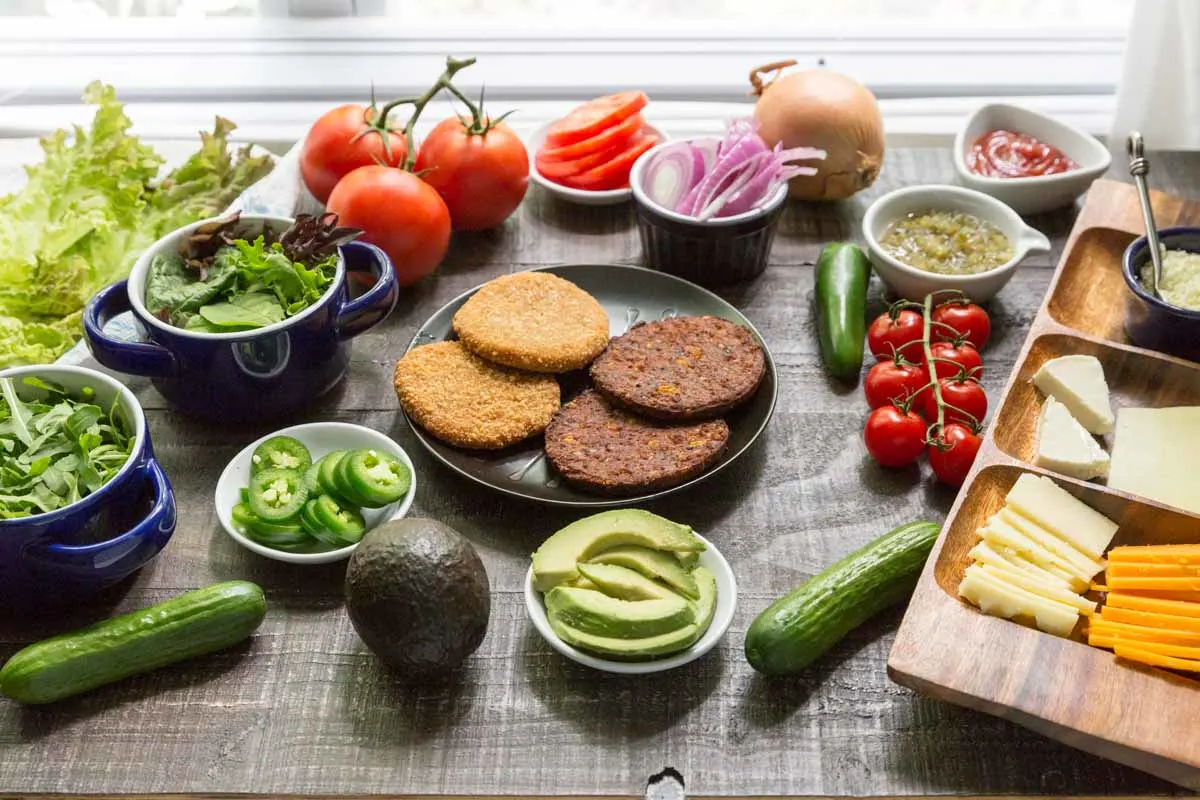 Vegetarian Burger Bar with MorningStar spicy black bean burgers and chickn patties with all the toppings you could want