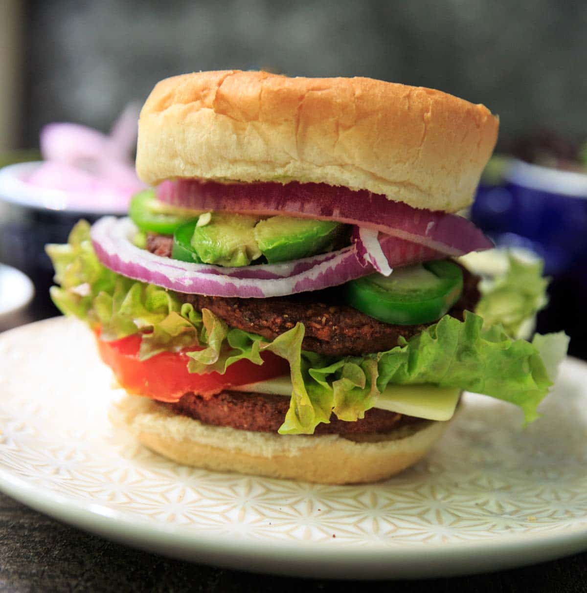 MorningStar Farms spicy black bean burger on a bun with toppings