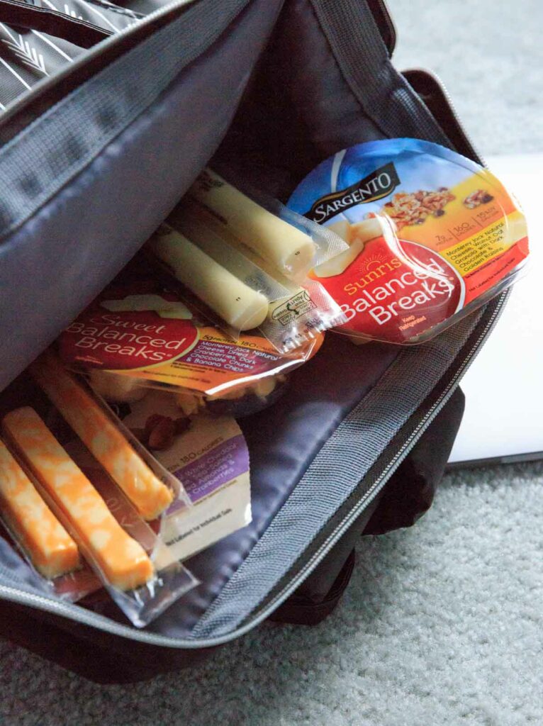 Packing Sargento cheese sticks and snacks in back pack