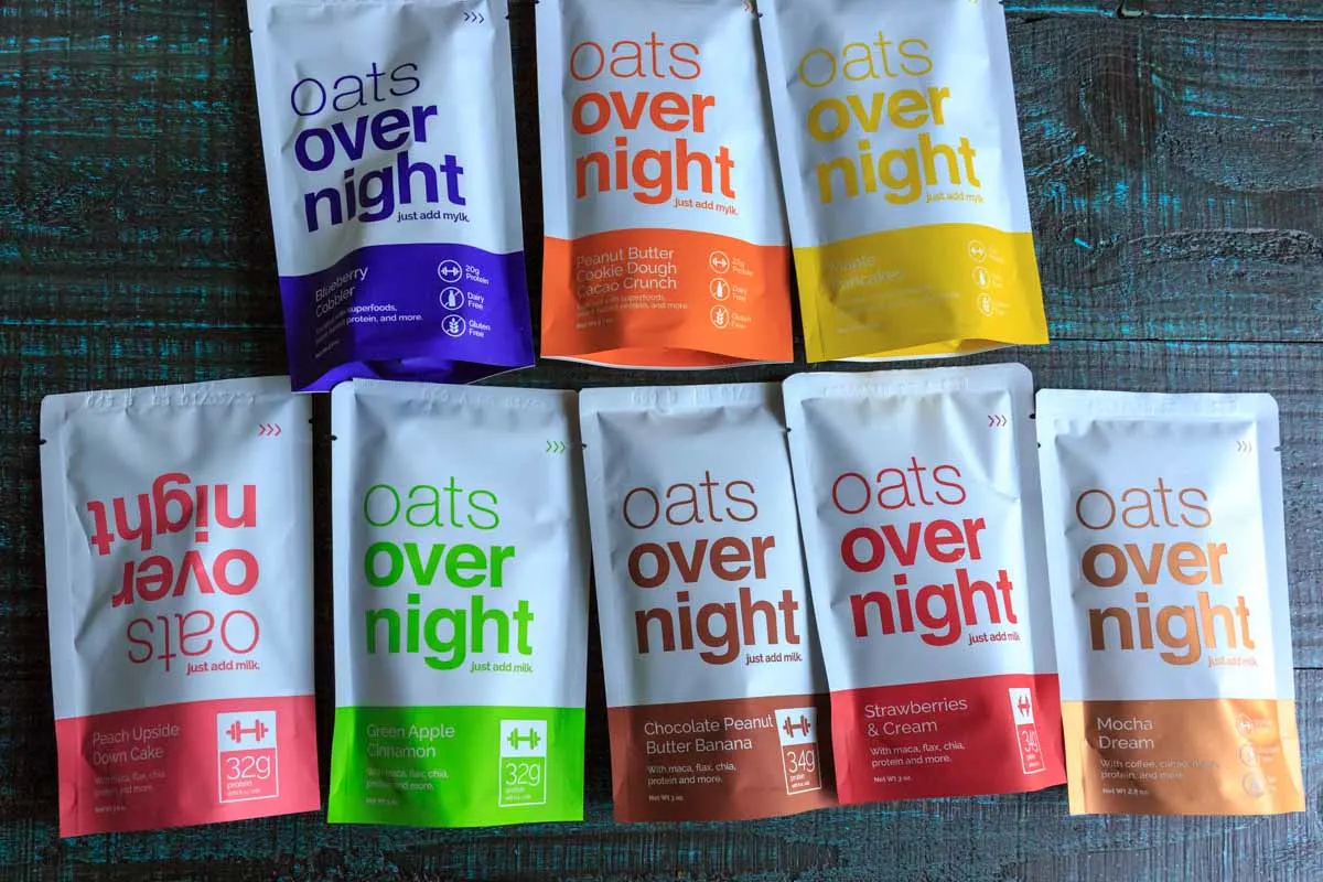 A picture of 8 flavors of oats overnight packets, plant based and vegetarian options