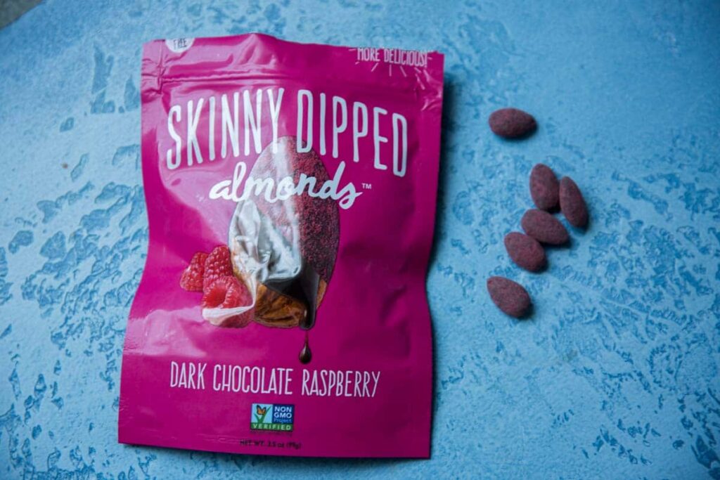 skinny dipped almonds dark chocolate raspberry bag