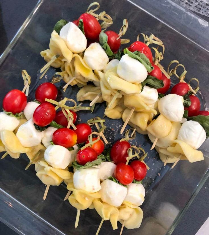 prepping caprese pasta salad skewers