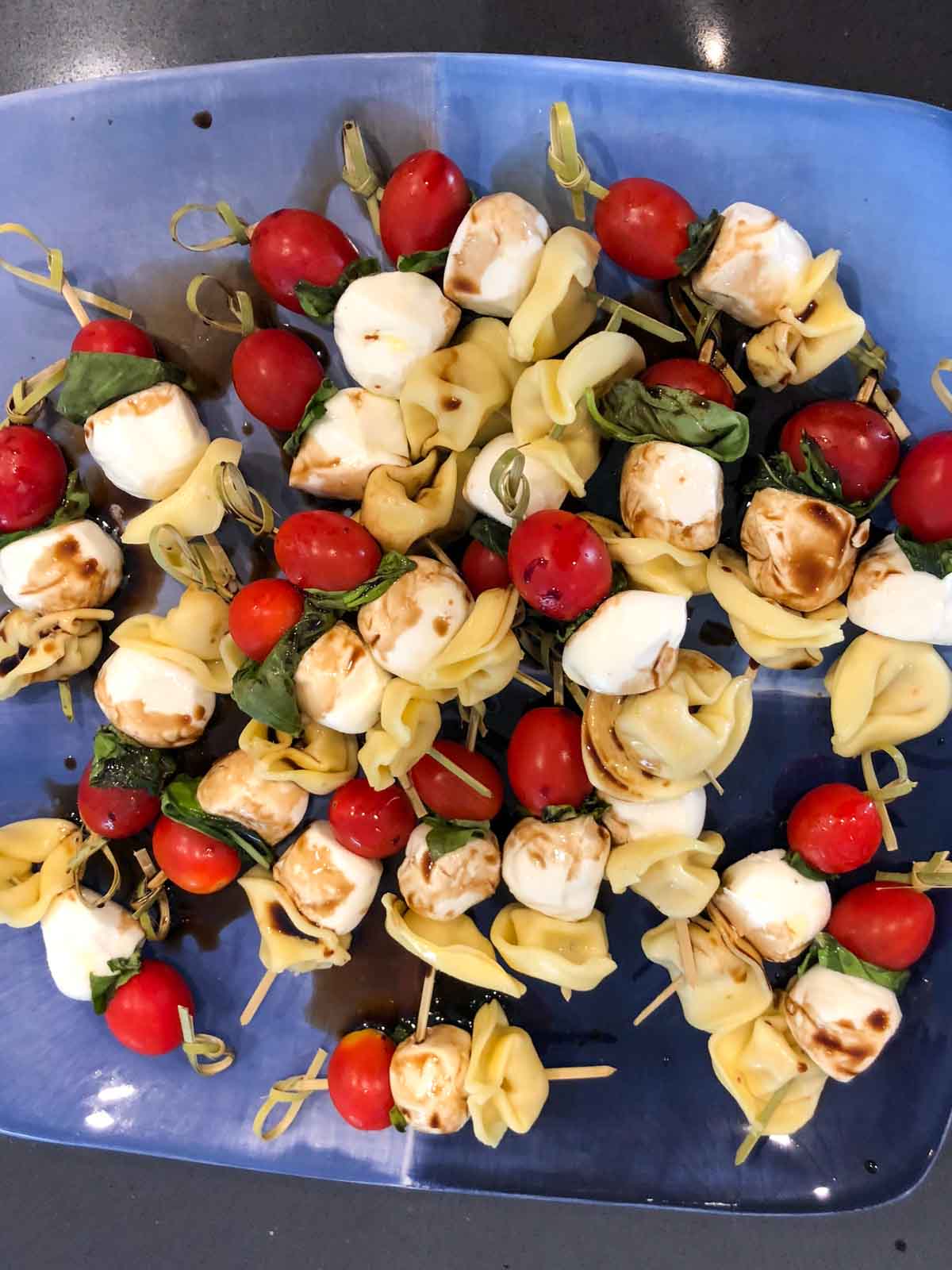 caprese pasta salad skewers with balsamic drizzle