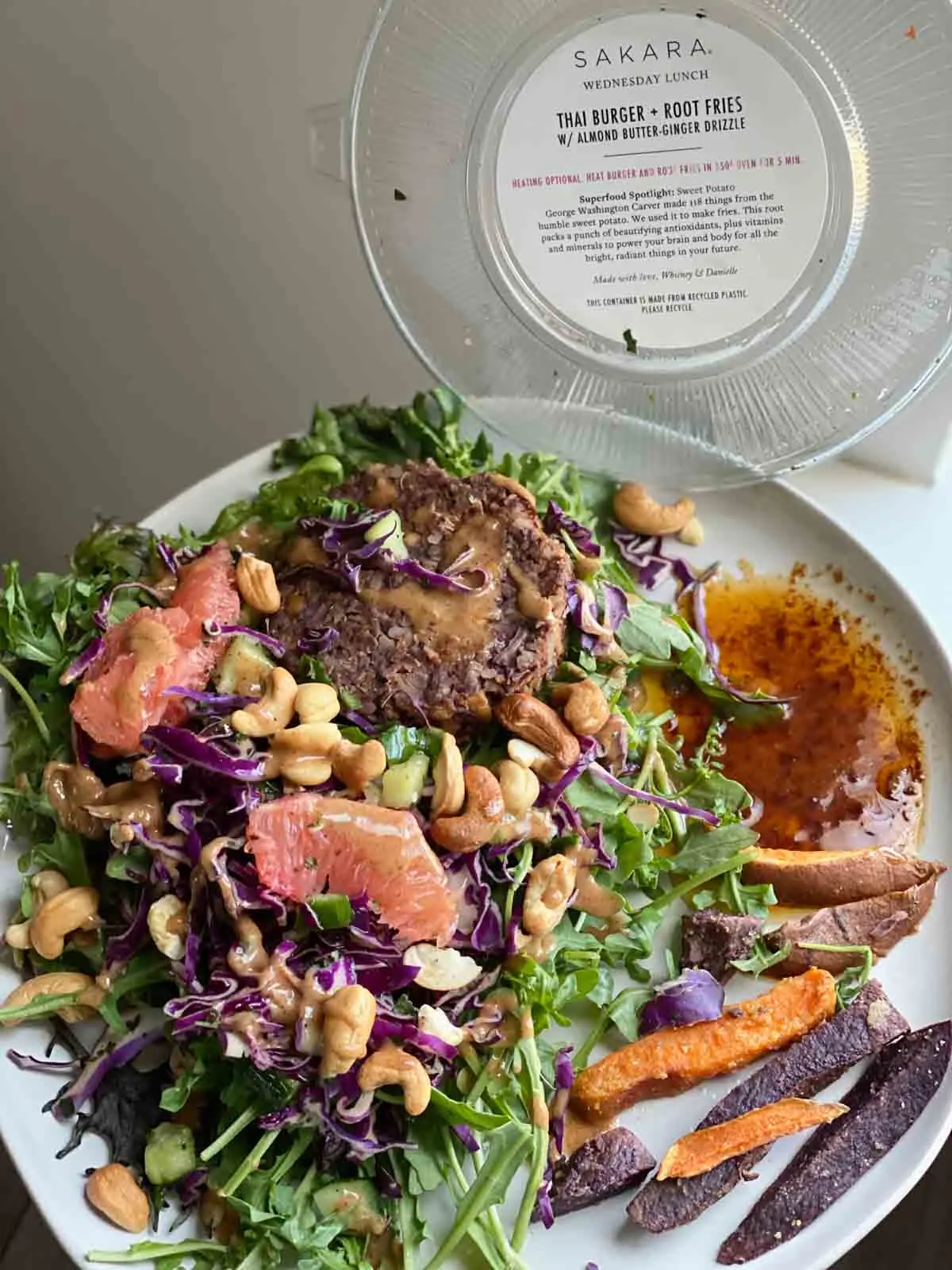 sakara thai burger and root fries with almond butter-ginger drizzle